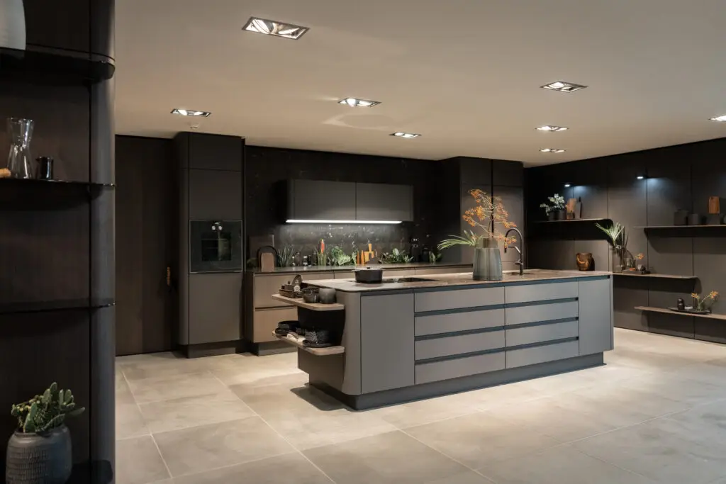 Modern luxury kitchen design with dark cabinetry and island by Mondial, Inplace Studio San Diego