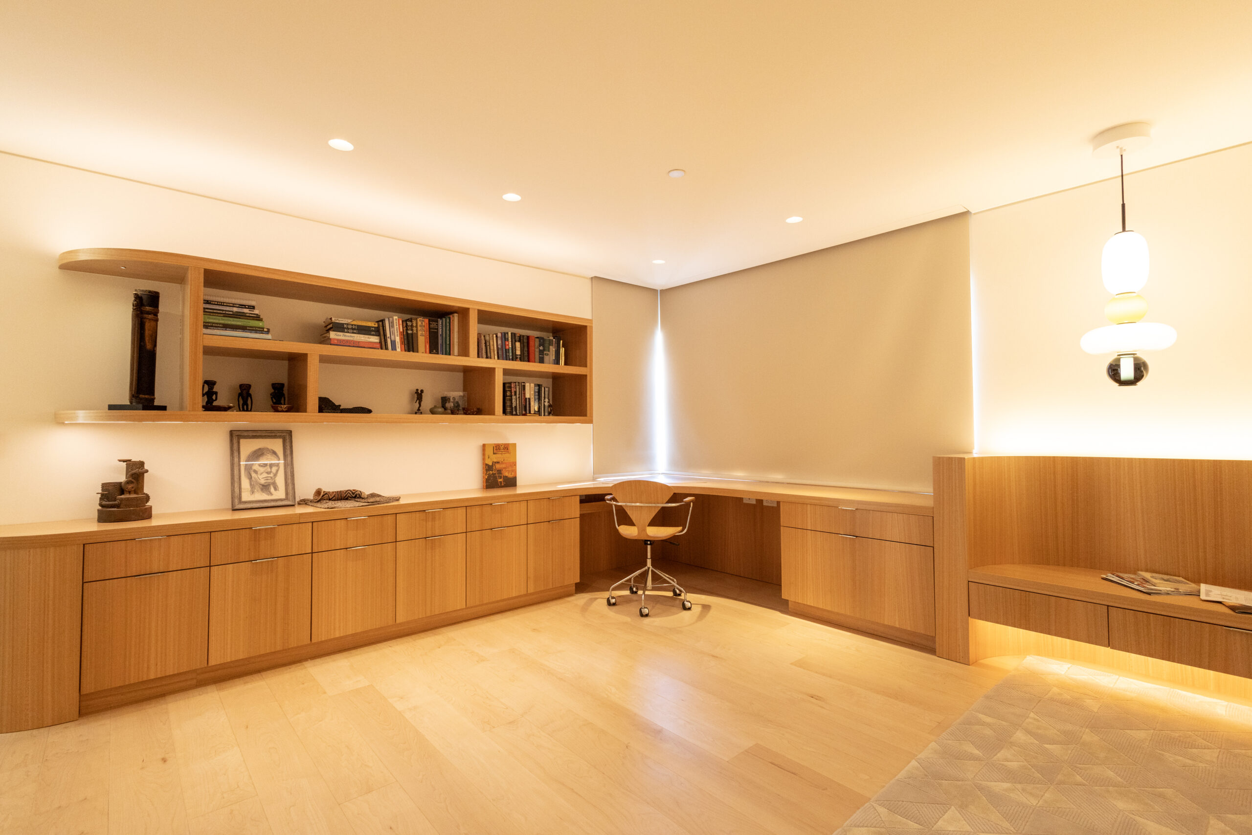 Custom home office with built-in desk shelving and wood cabinetry &mdash; Inplace Studio La Jolla San Diego