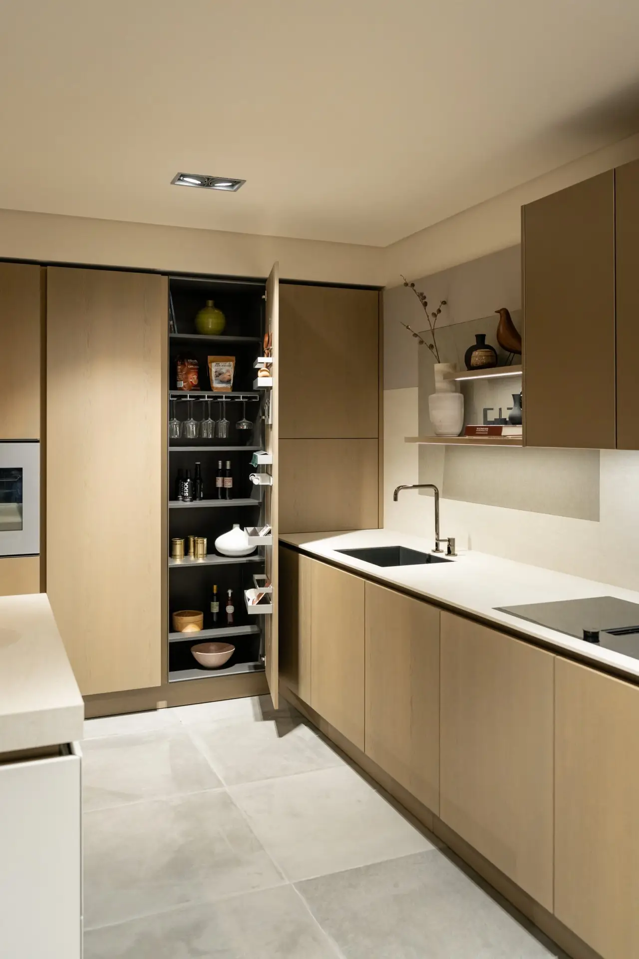 SieMatic pantry interior organization with door-mounted shelving