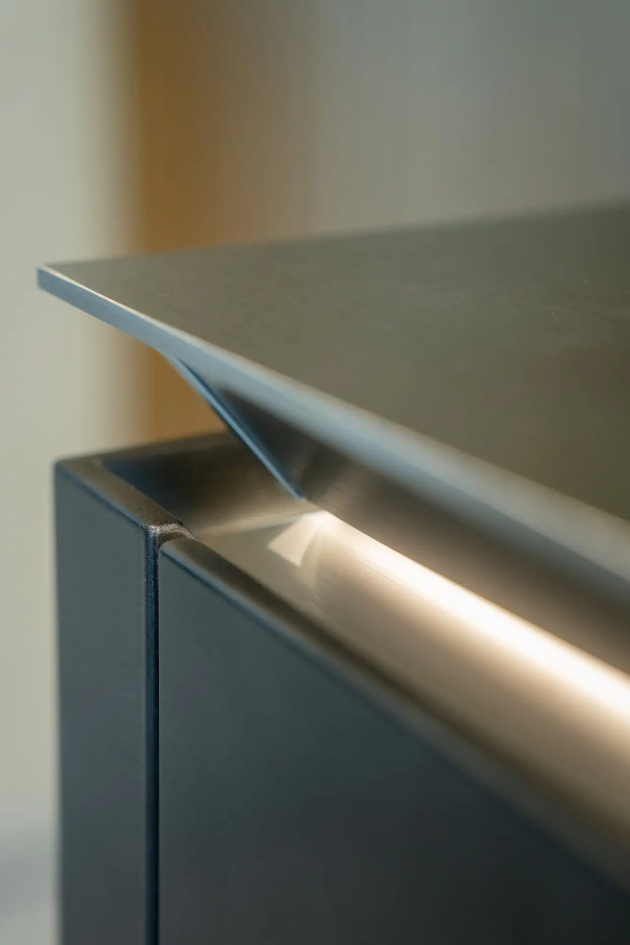 SieMatic SLX illuminated recessed grip channel — handleless detail