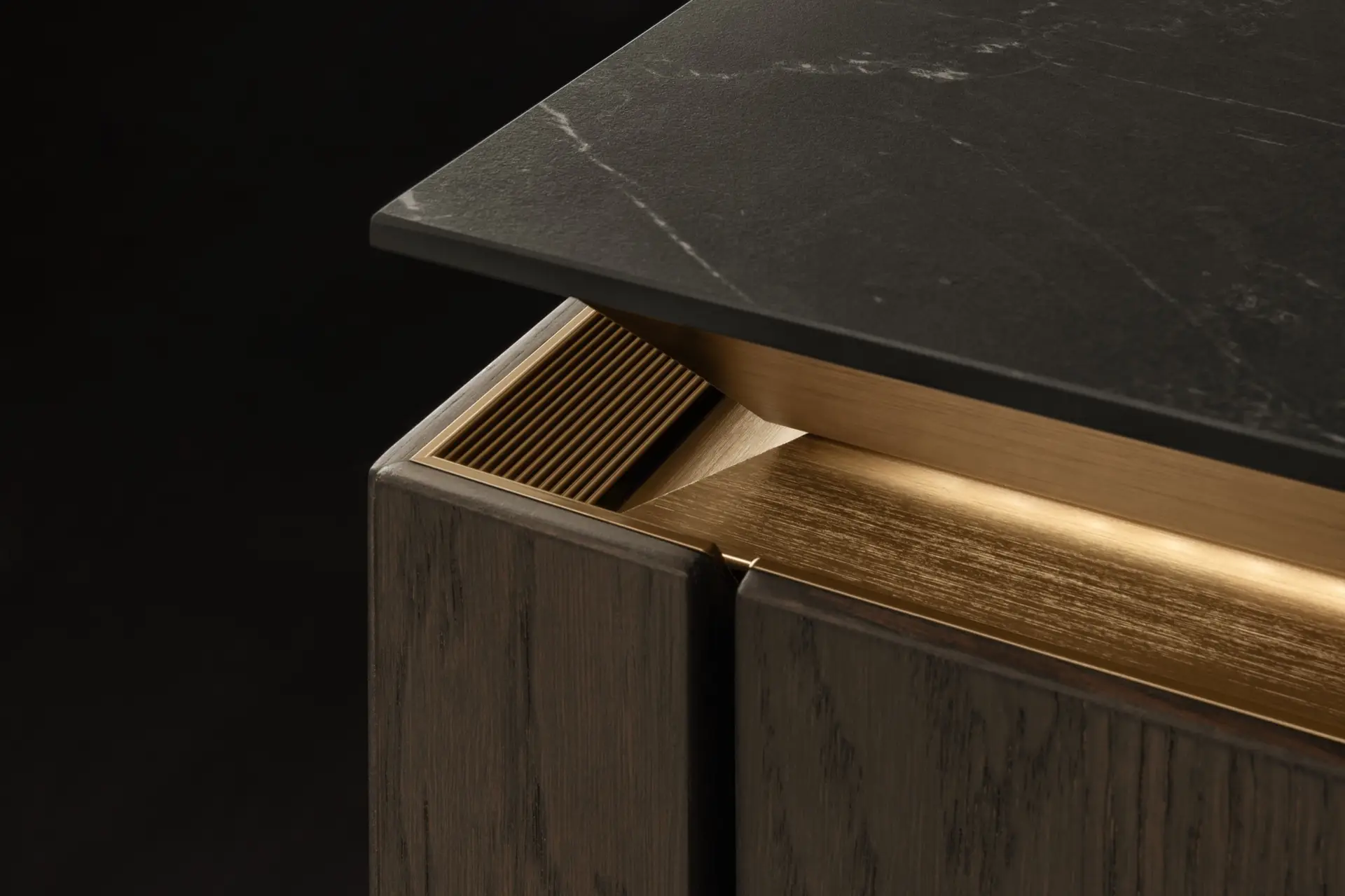SieMatic SLX smoked oak door with gold grip channel and black marble top
