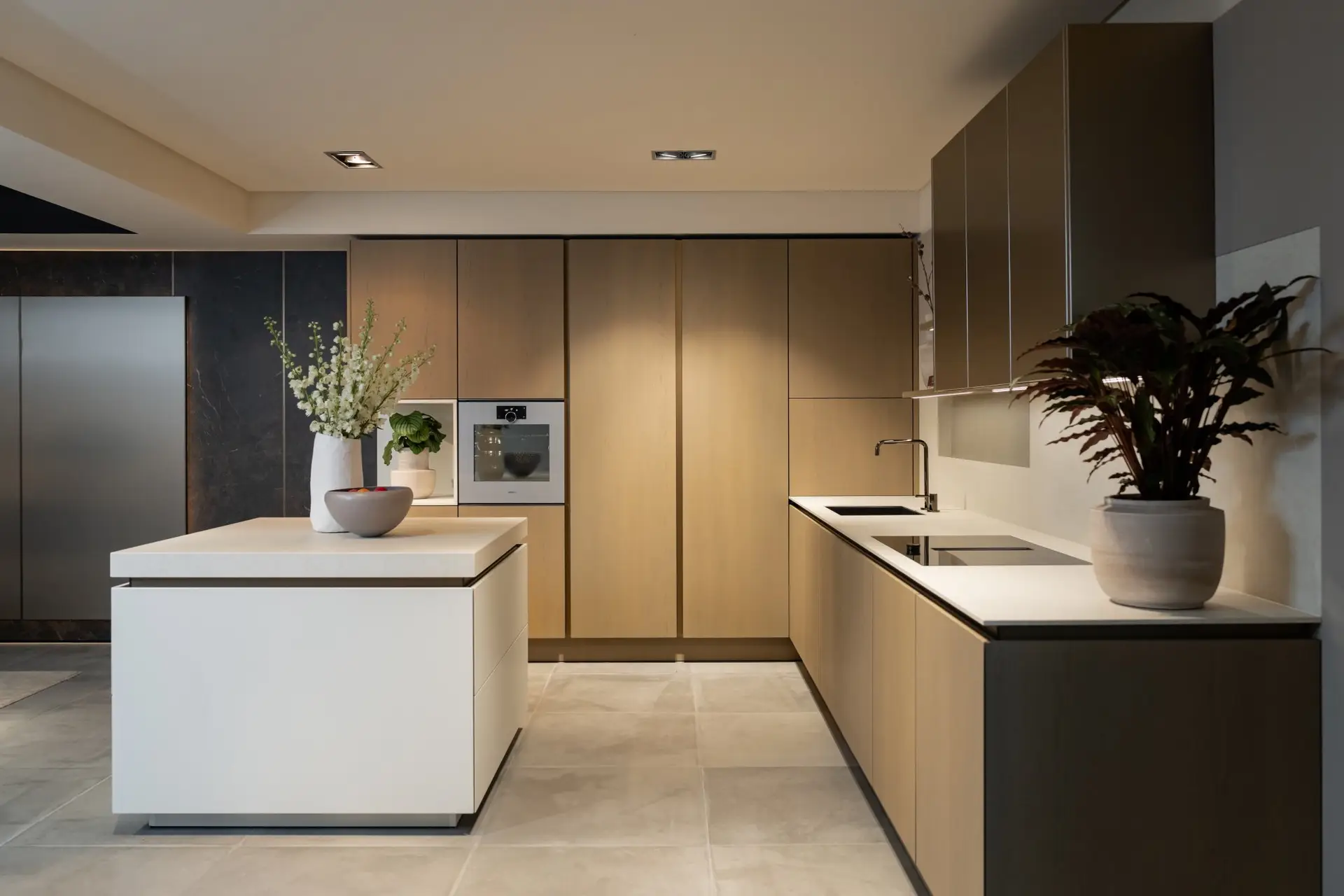 SieMatic SLX kitchen with white island and bronze tall cabinets