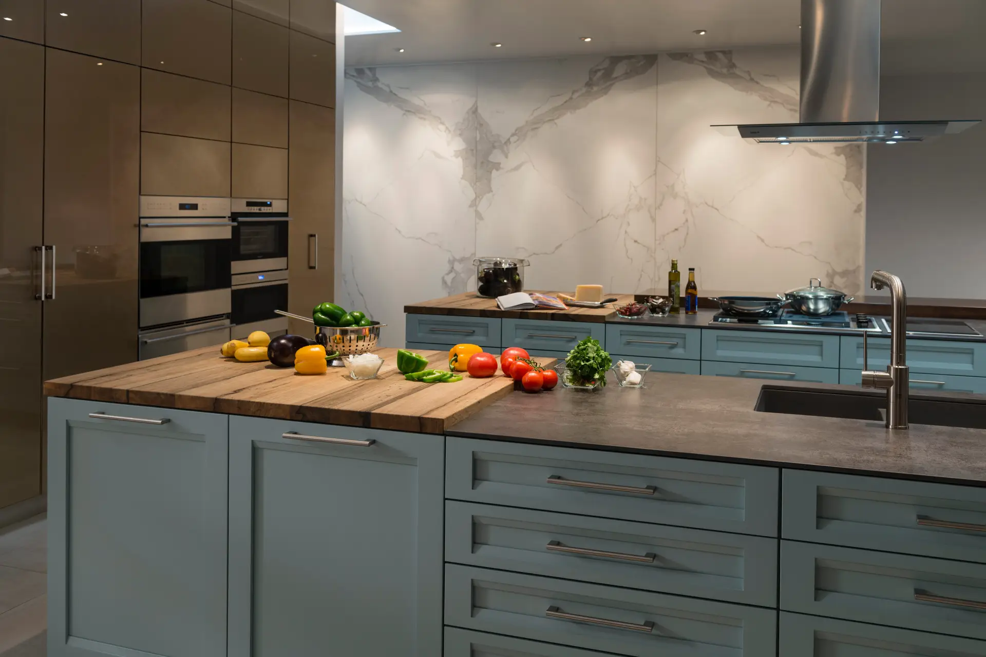 Modern kitchen with custom cabinetry, featuring elegant storage cabinets and high-end appliances in a sophisticated San Diego home, designed for expert organization and style.