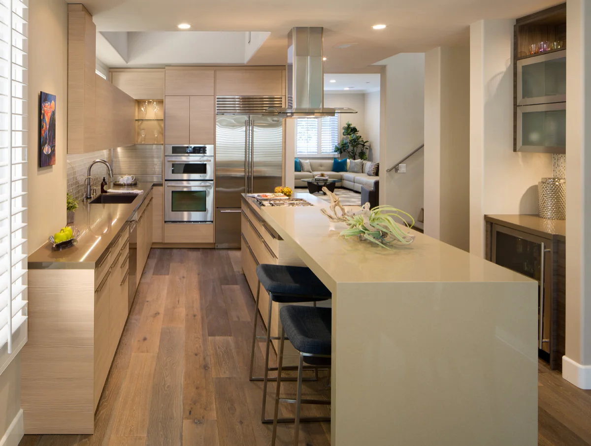 Modern kitchen with custom cabinetry featuring sleek lines and elegant materials