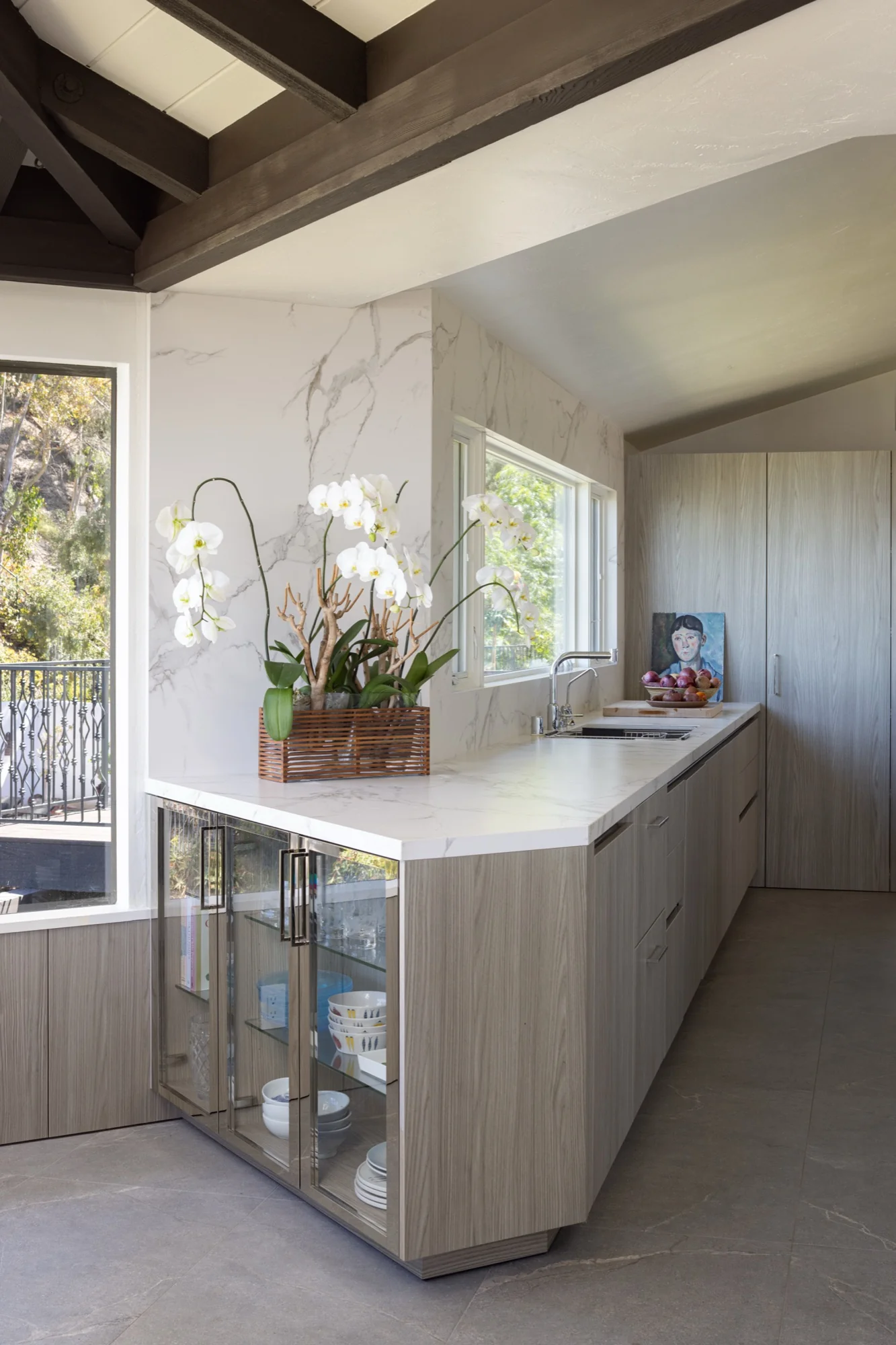 La Jolla kitchen with glass-front display cabinetry and Dekton countertop