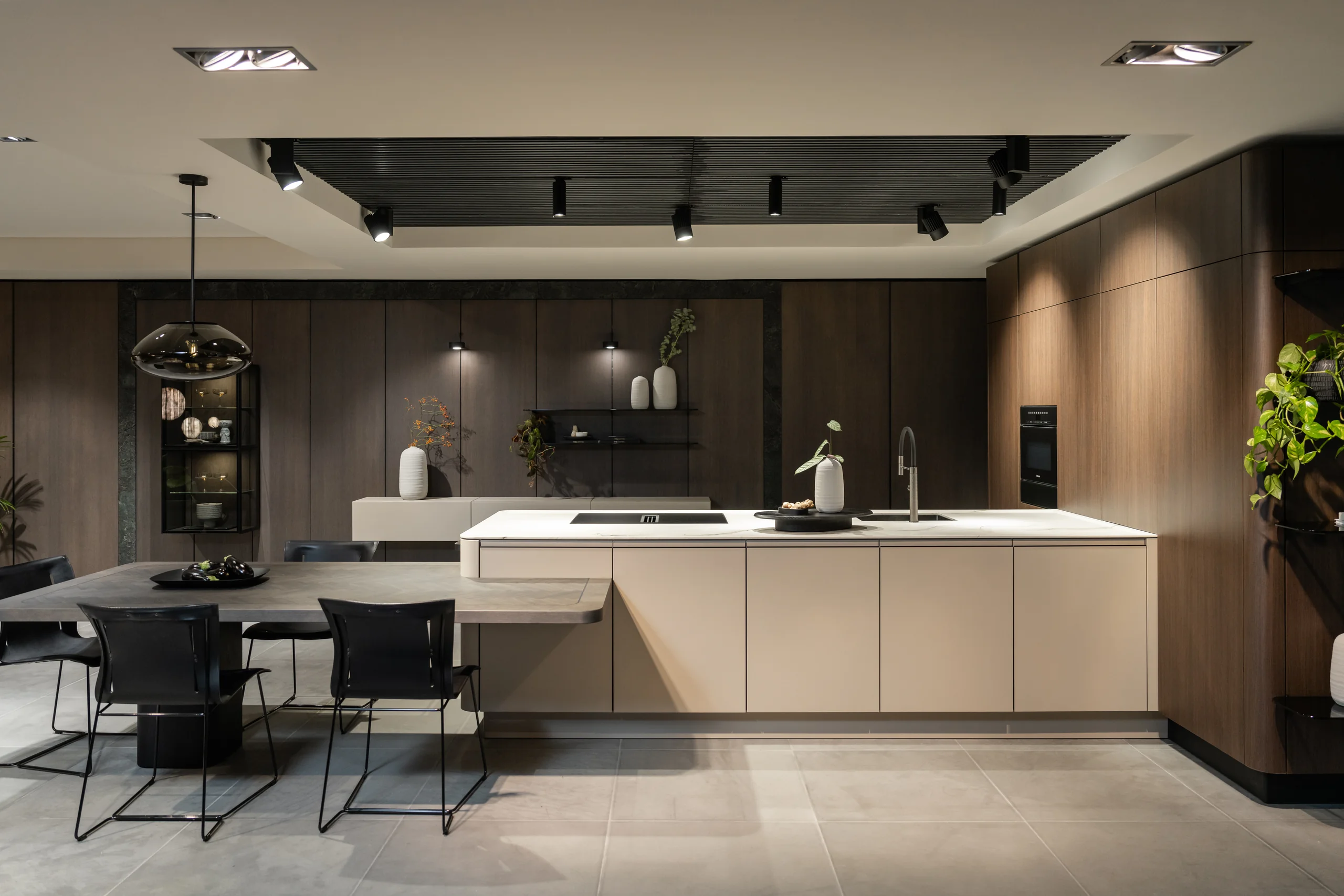 Custom kitchen curved island warm wood cabinetry &mdash; Inplace Studio Southern California